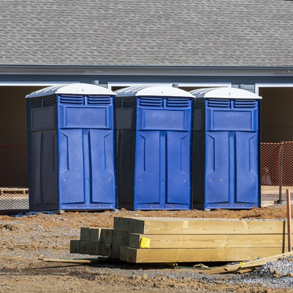 how often are the porta potties cleaned and serviced during a rental period in Byfield